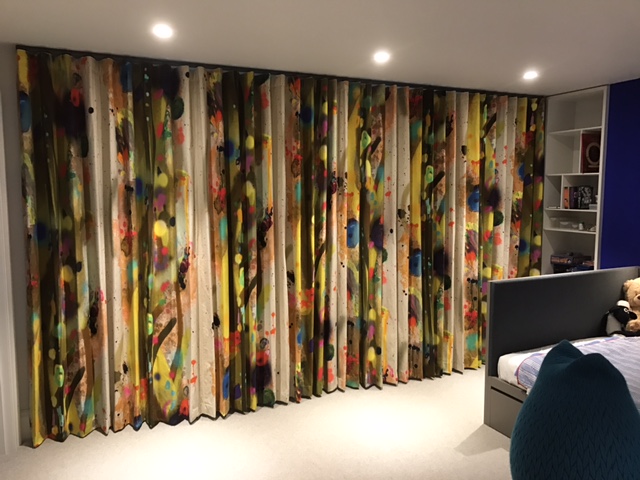 Closed bespoke wave curtains in colourful fabric