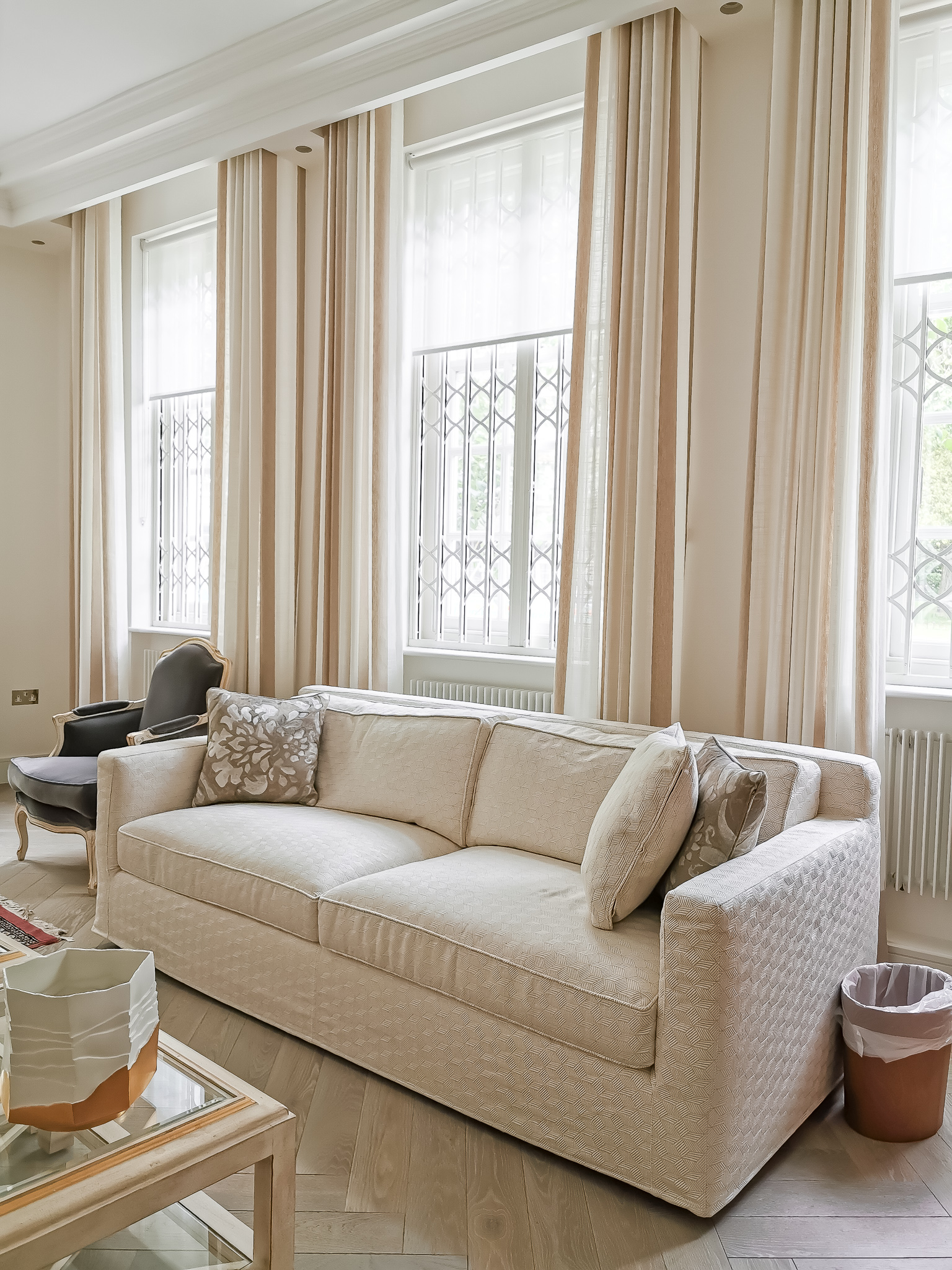 Re-covered sofa and sheer living room curtains
