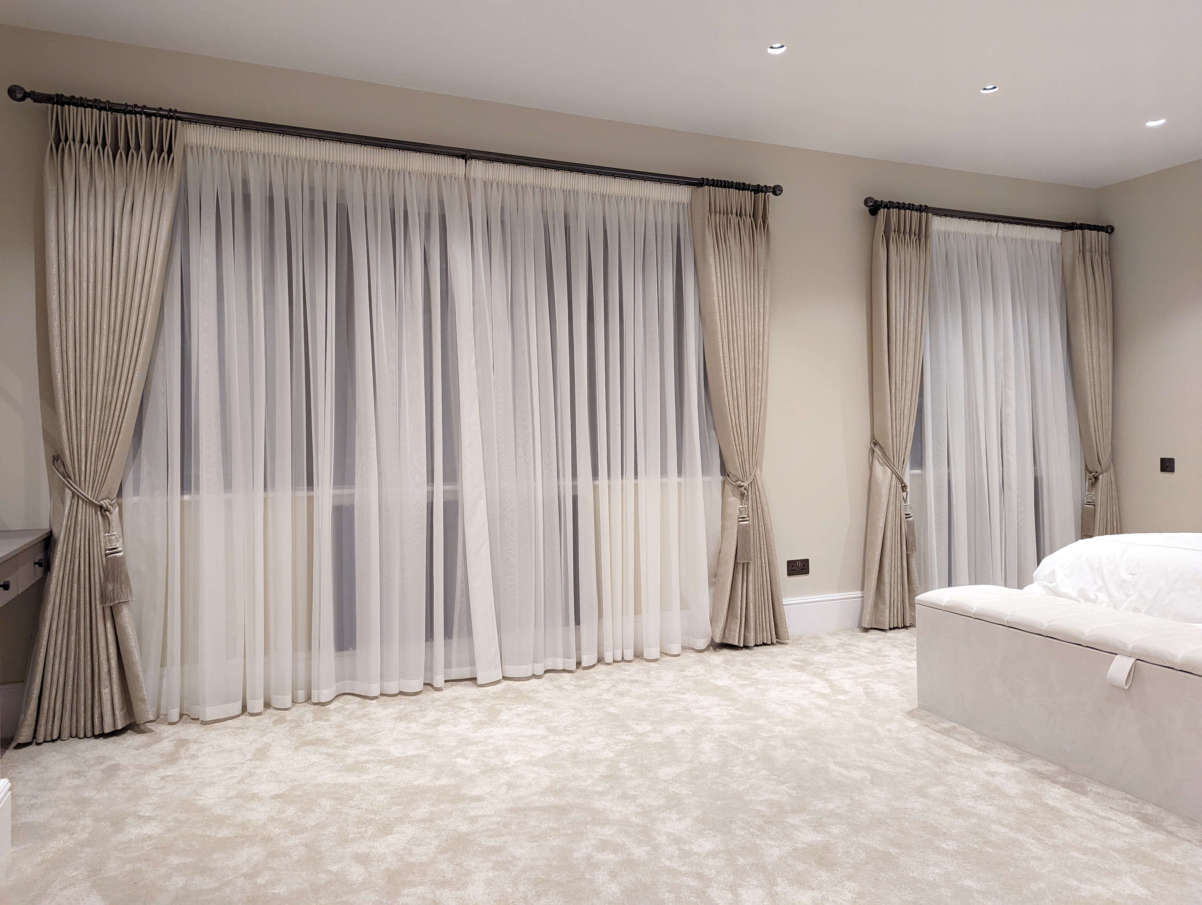 Bedroom Curtains with Dark Poles and Pencil Pleated Sheers
