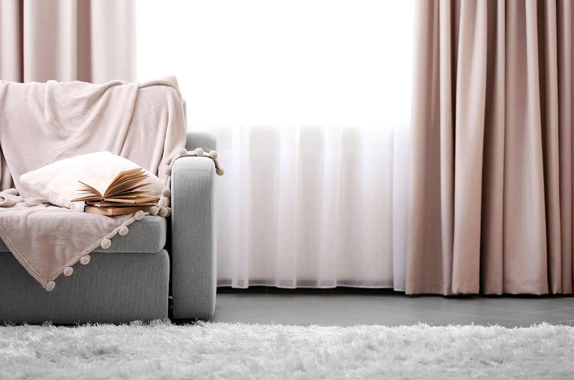 Soft pink wave curtains and sofa dressing