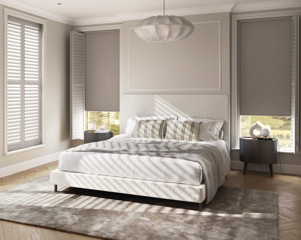 Austin shutters shown with independently operated honeycomb blinds